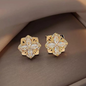 ARETES GIRATORIOS TRÉBOL DE CUATRO HOJAS